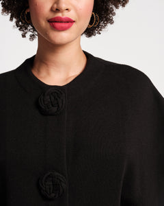 Carnegie Shrug Solid w/Floral Button 100% Merino Wool Black